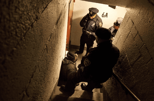 Cops roust a resident in the projects (courtesy nytimes.com)