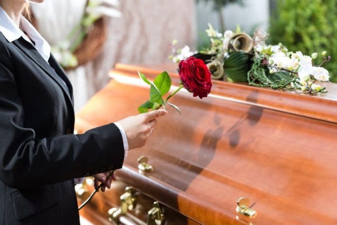 funeral coffin via shutterstock