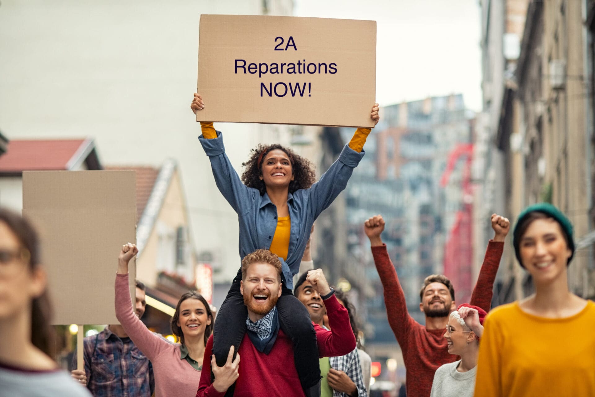 2A reparations protest sign